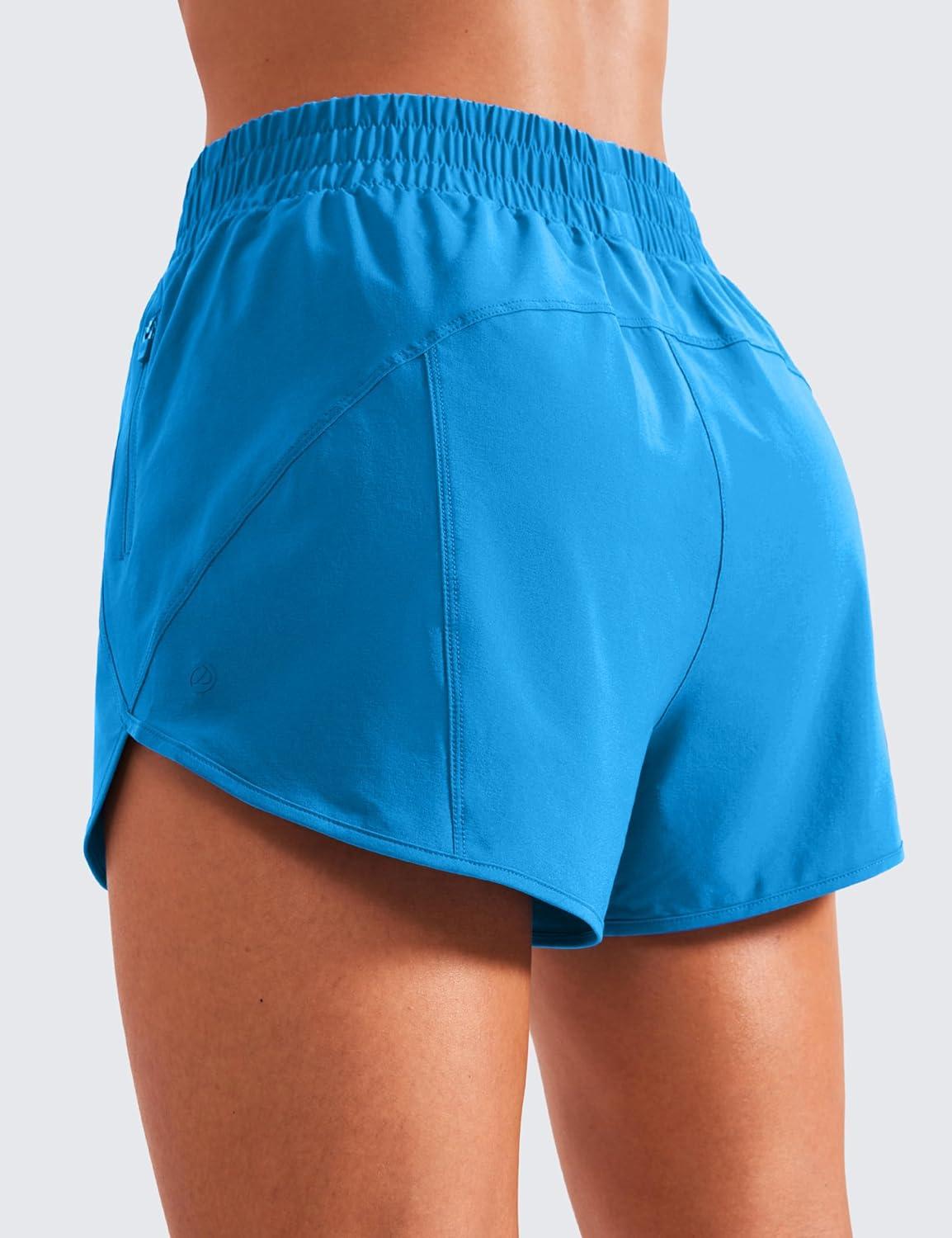 imageCRZ YOGA Dolphin Athletic Shorts for Women 3quot High Waisted Quick Dry for Running Workout Gym Track with Zip PocketMadagascar Blue