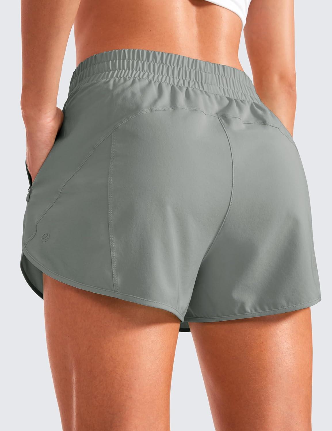 imageCRZ YOGA Dolphin Athletic Shorts for Women 3quot High Waisted Quick Dry for Running Workout Gym Track with Zip PocketSterling