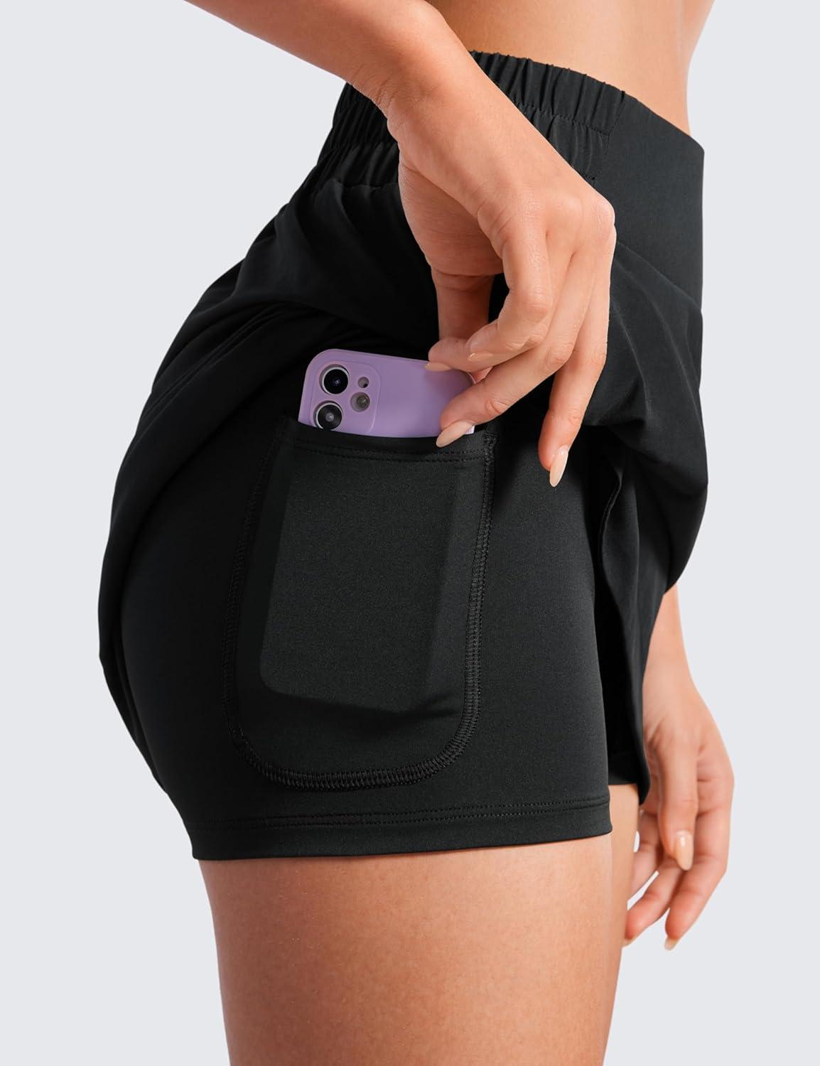 imageCRZ YOGA High Waisted Dolphin Golf Skirts for Women Mini Lined A Line Tennis Casual Skort with Side PocketsBlack