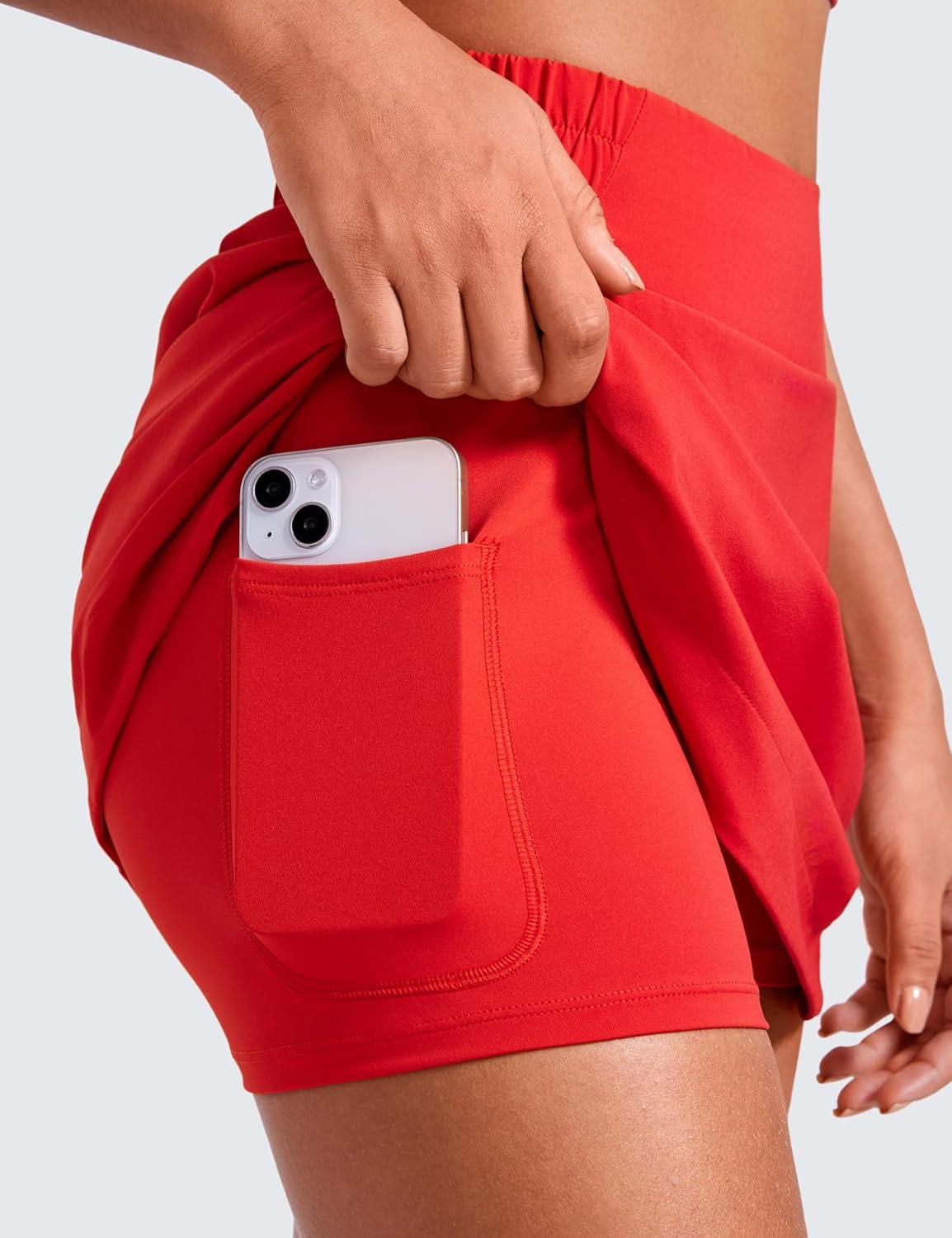 imageCRZ YOGA High Waisted Dolphin Golf Skirts for Women Mini Lined A Line Tennis Casual Skort with Side PocketsDeep Red
