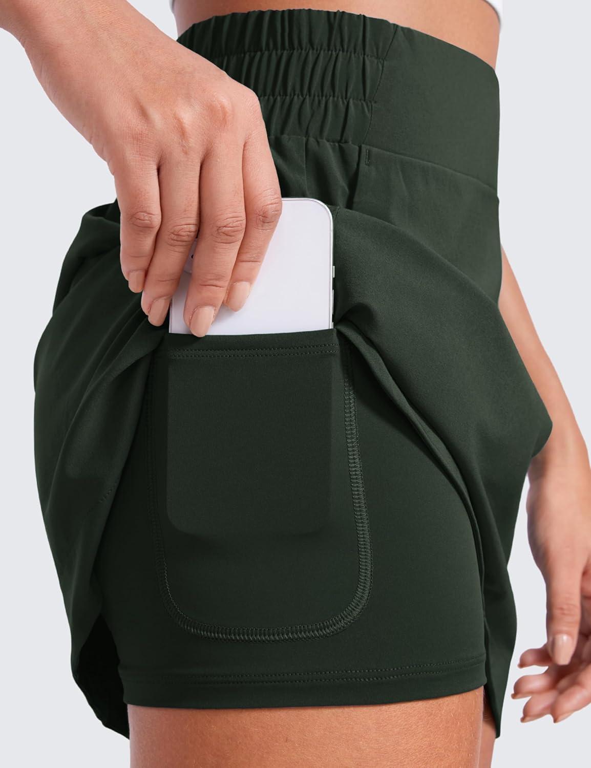 imageCRZ YOGA High Waisted Dolphin Golf Skirts for Women Mini Lined A Line Tennis Casual Skort with Side PocketsLegend Green