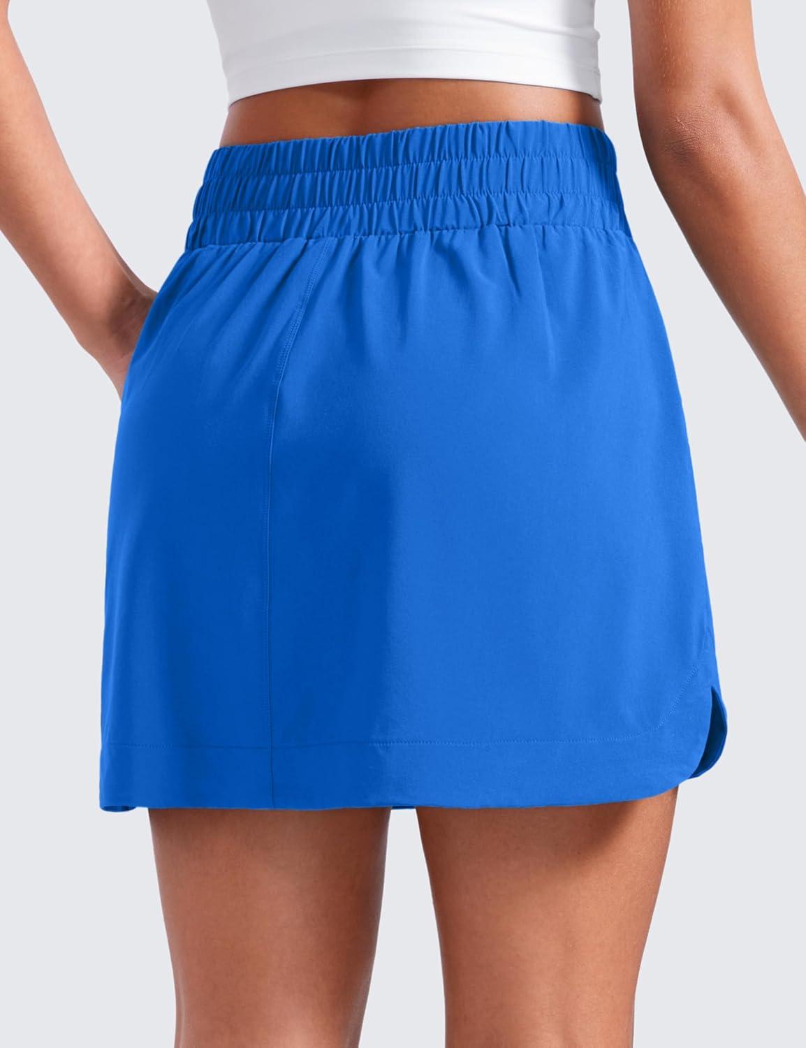 imageCRZ YOGA High Waisted Dolphin Golf Skirts for Women Mini Lined A Line Tennis Casual Skort with Side PocketsSparkle Blue