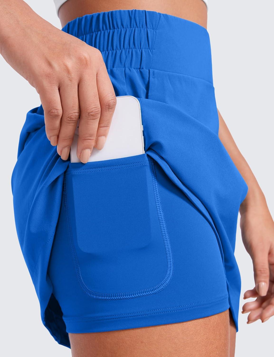 imageCRZ YOGA High Waisted Dolphin Golf Skirts for Women Mini Lined A Line Tennis Casual Skort with Side PocketsSparkle Blue