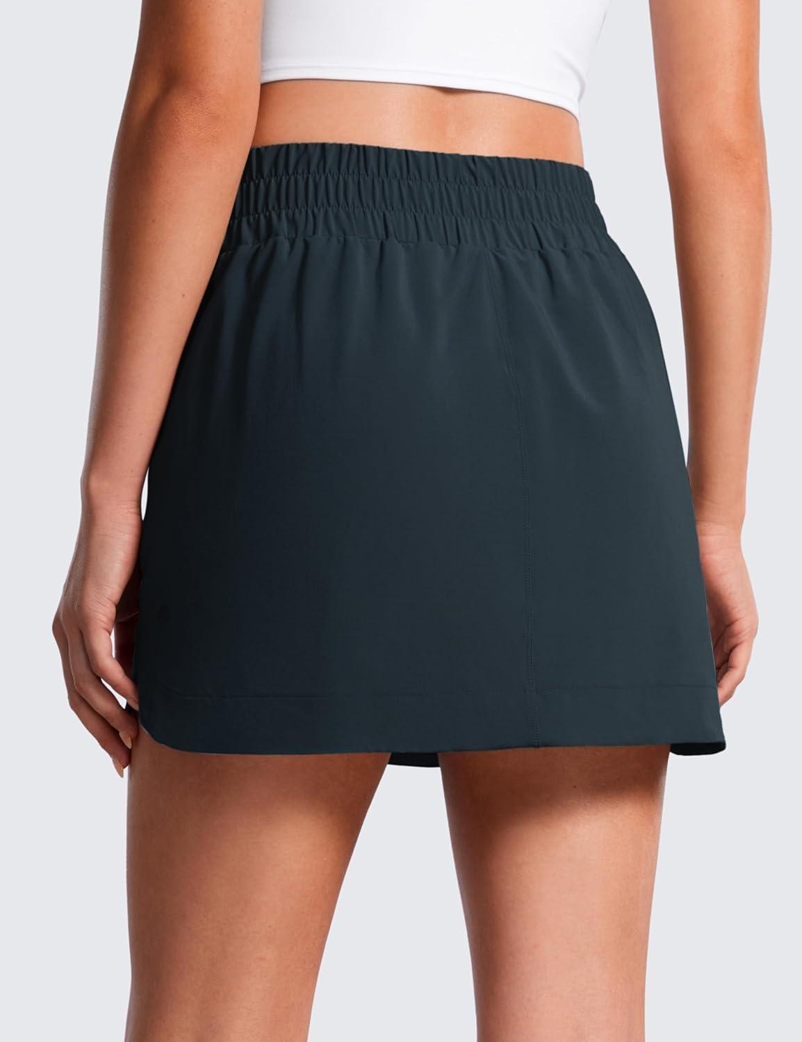 imageCRZ YOGA High Waisted Dolphin Golf Skirts for Women Mini Lined A Line Tennis Casual Skort with Side PocketsTrue Navy