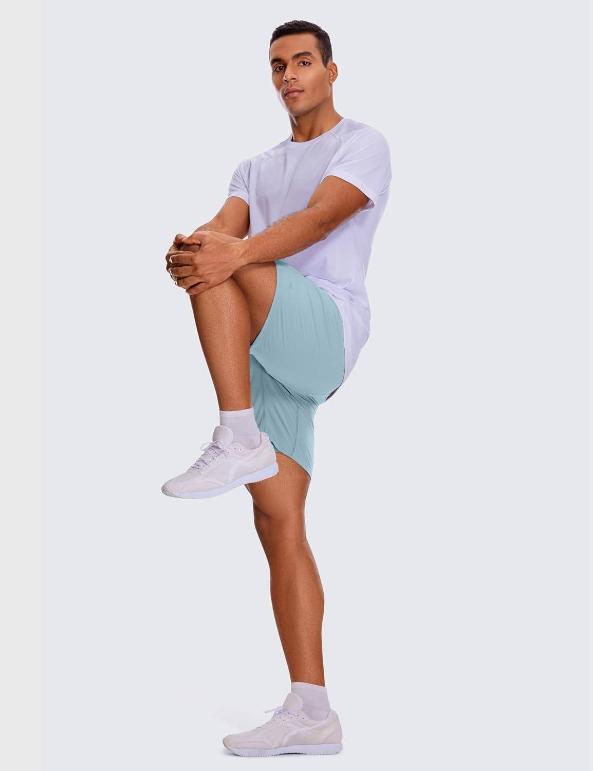 imageCRZ YOGA Mens 2 in 1 Running Shorts 7quot Lined Workout Quick Dry Lightweight for Sports Athletic with PocketsLight Grayish Blue