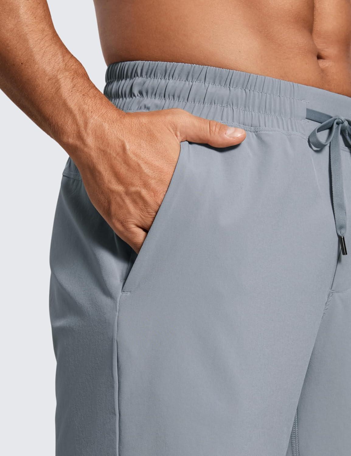 imageCRZ YOGA Mens Linerless Workout Shorts 7 Quick Dry for Running Sports Athletic Gym with PocketsDark Carbon