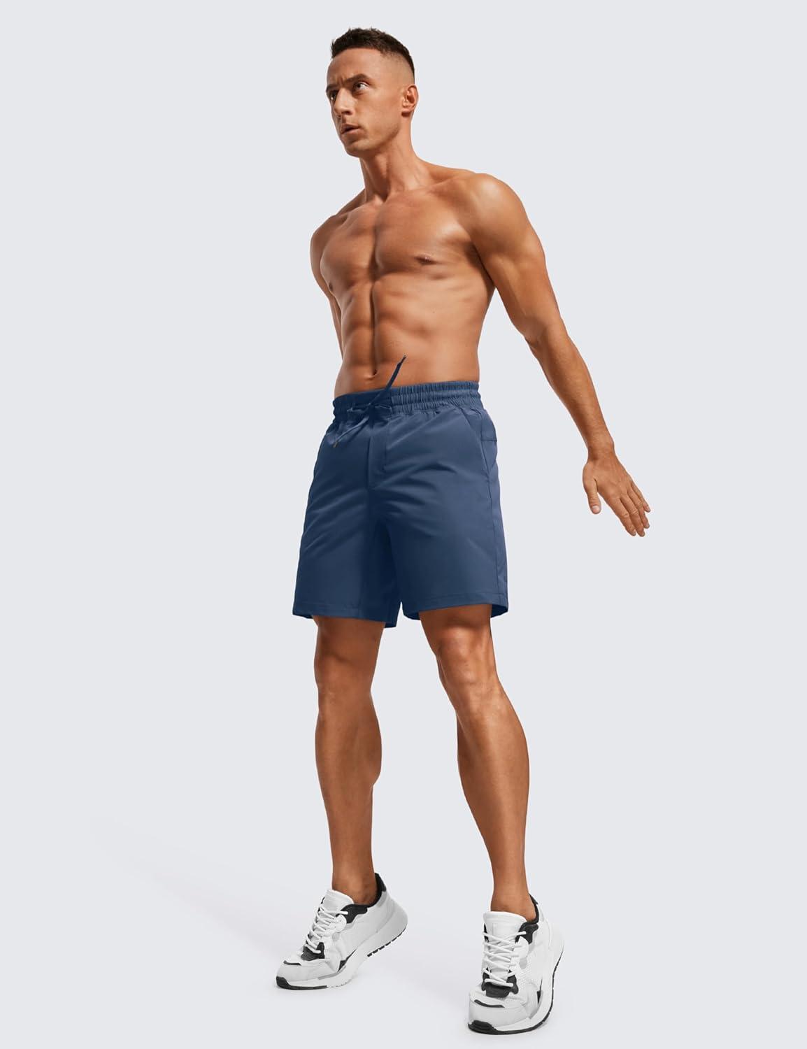 imageCRZ YOGA Mens Linerless Workout Shorts 7 Quick Dry for Running Sports Athletic Gym with PocketsElectric Blue