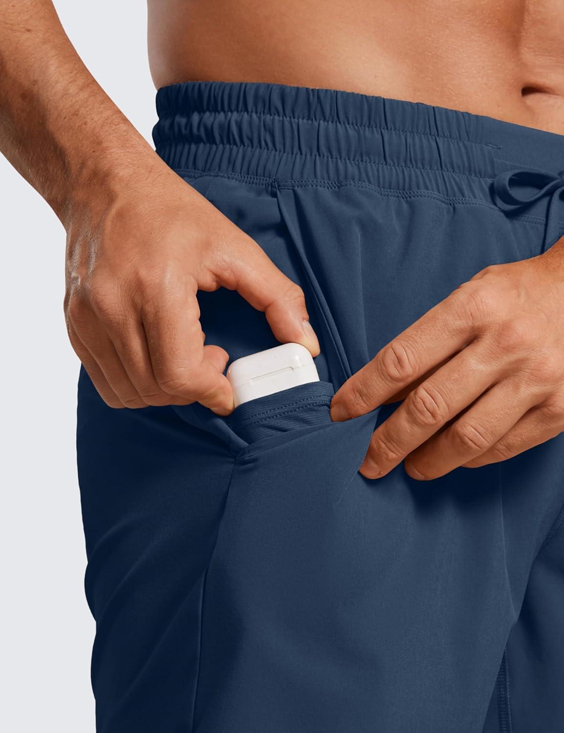 imageCRZ YOGA Mens Linerless Workout Shorts 7 Quick Dry for Running Sports Athletic Gym with PocketsElectric Blue