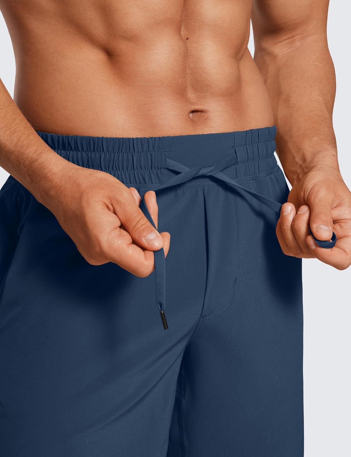 imageCRZ YOGA Mens Linerless Workout Shorts 7 Quick Dry for Running Sports Athletic Gym with PocketsElectric Blue