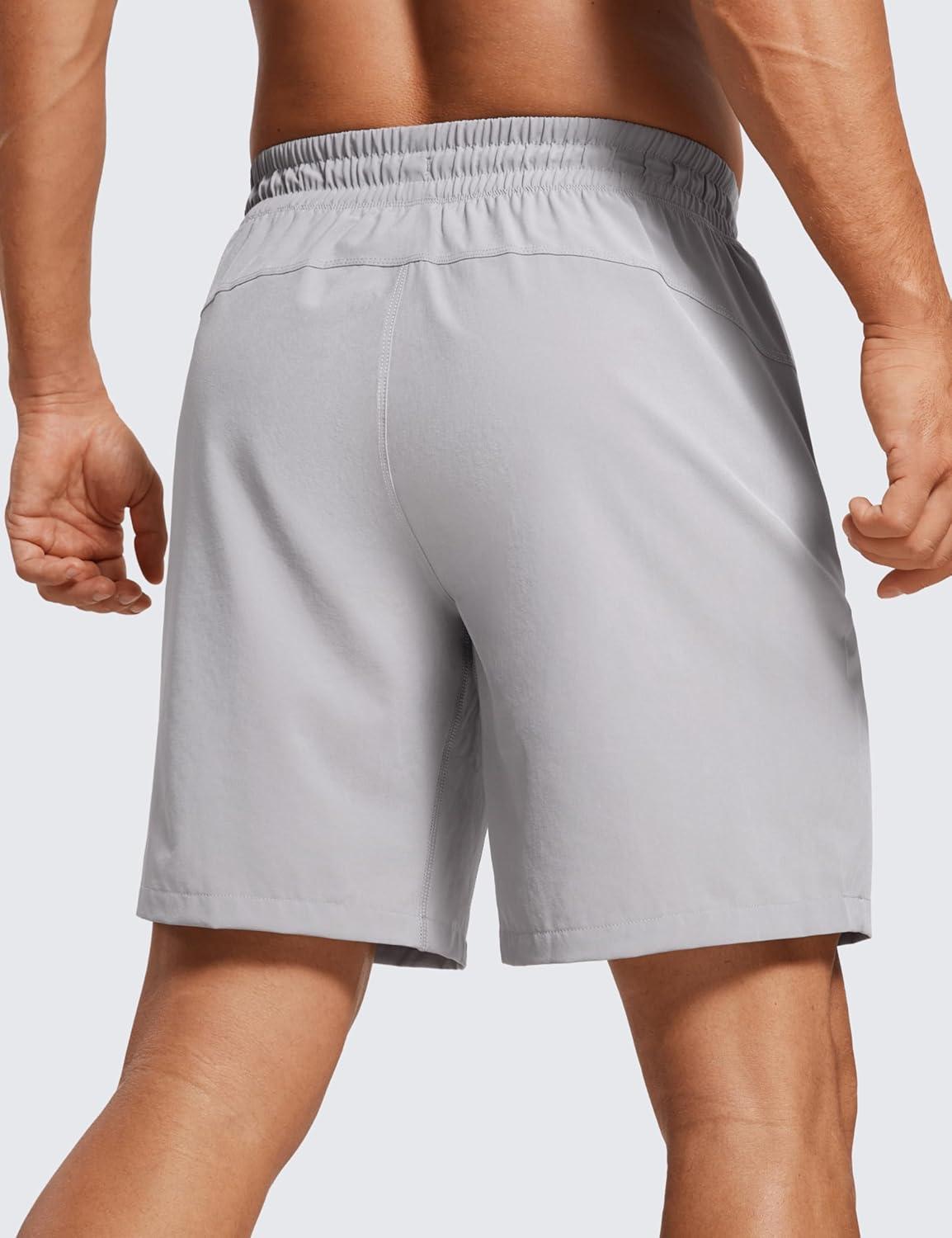 imageCRZ YOGA Mens Linerless Workout Shorts 7 Quick Dry for Running Sports Athletic Gym with PocketsGull Gray