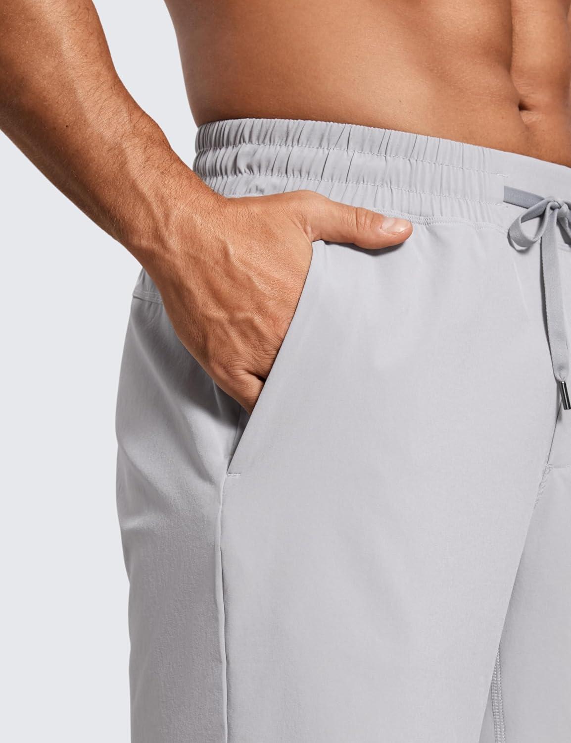 imageCRZ YOGA Mens Linerless Workout Shorts 7 Quick Dry for Running Sports Athletic Gym with PocketsGull Gray