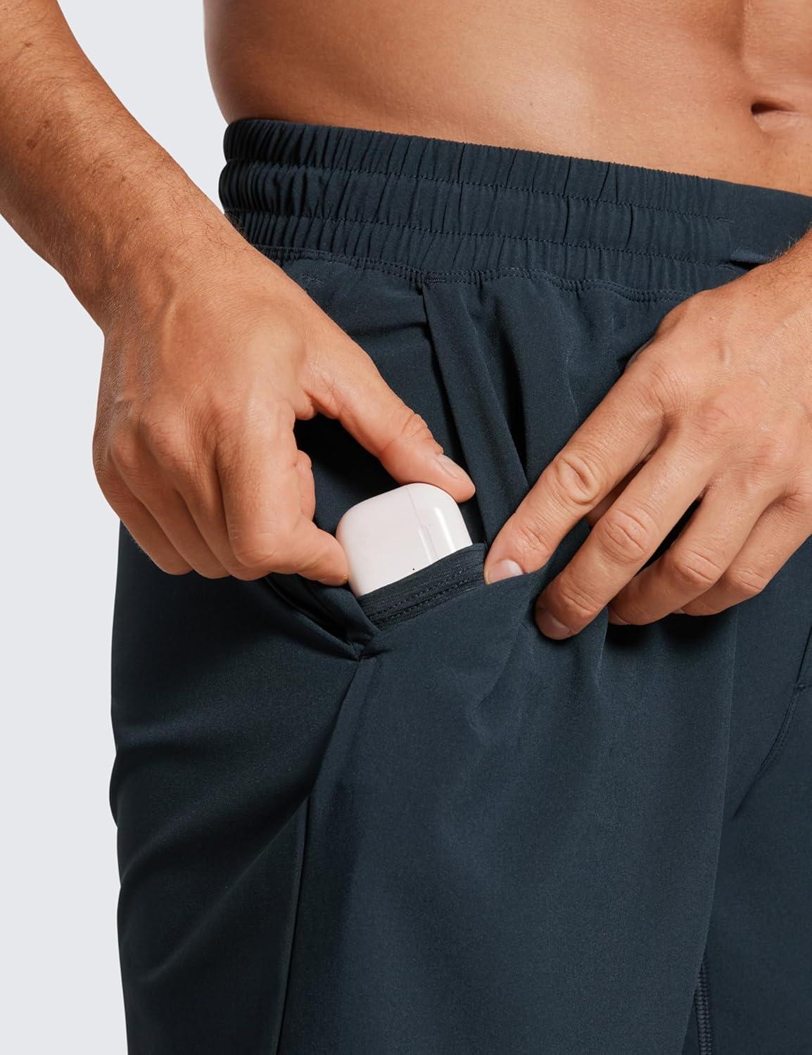 imageCRZ YOGA Mens Linerless Workout Shorts 7 Quick Dry for Running Sports Athletic Gym with PocketsInk Gray