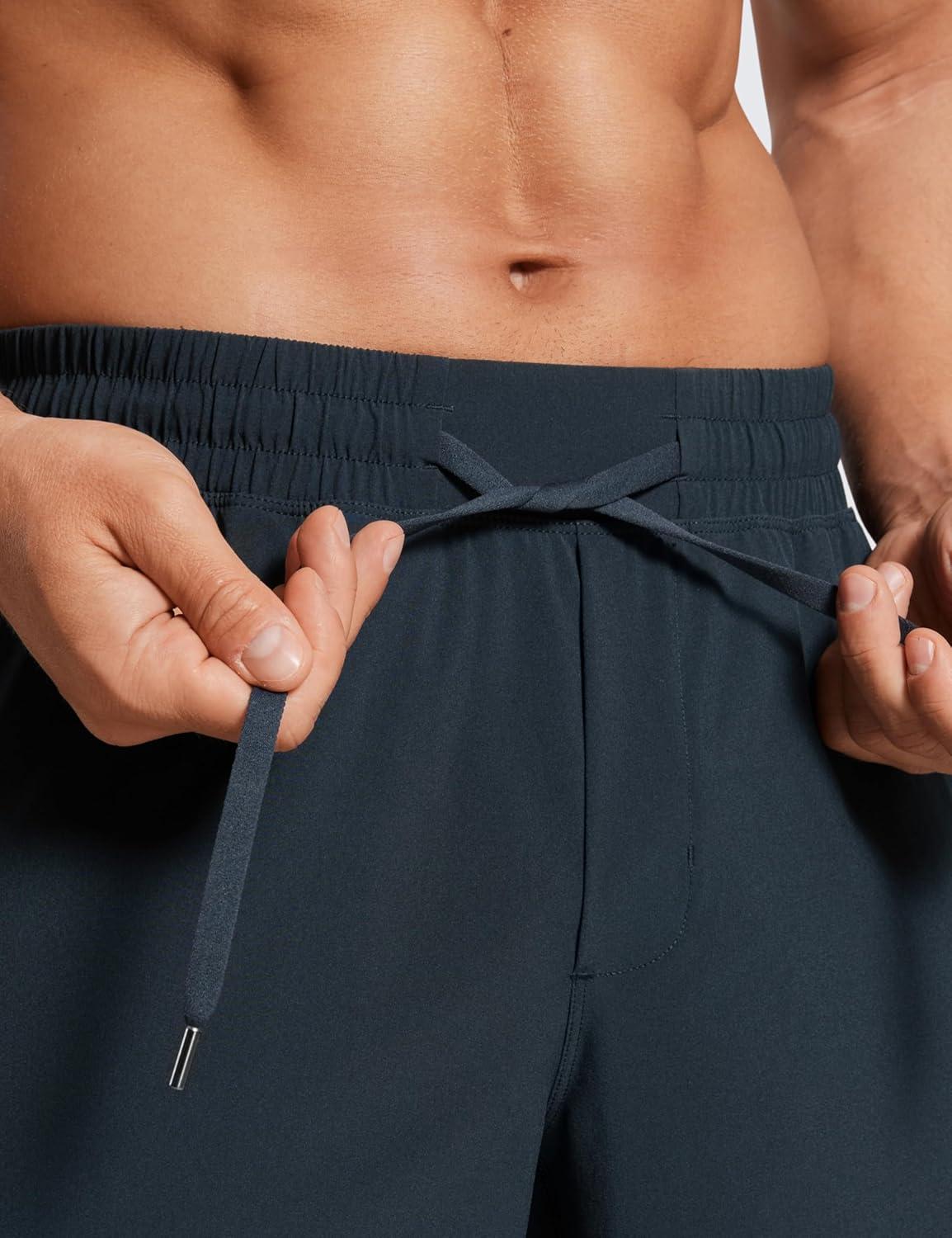 imageCRZ YOGA Mens Linerless Workout Shorts 7 Quick Dry for Running Sports Athletic Gym with PocketsInk Gray