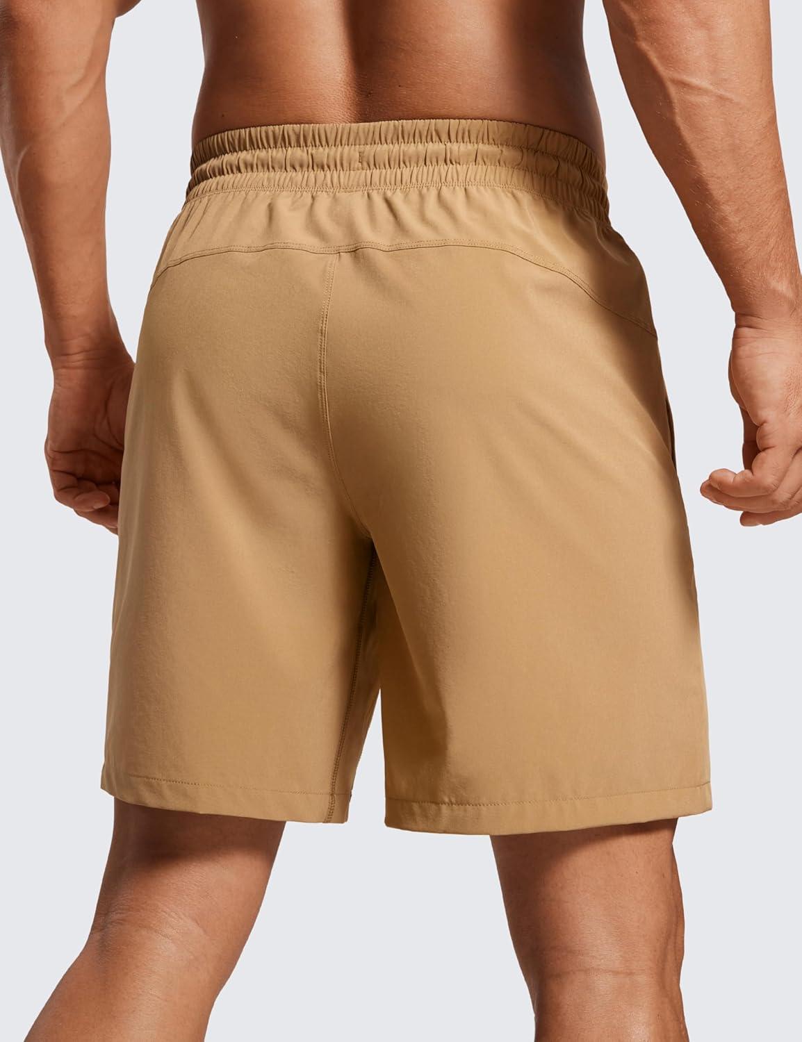 imageCRZ YOGA Mens Linerless Workout Shorts 7 Quick Dry for Running Sports Athletic Gym with PocketsKhaki Sand