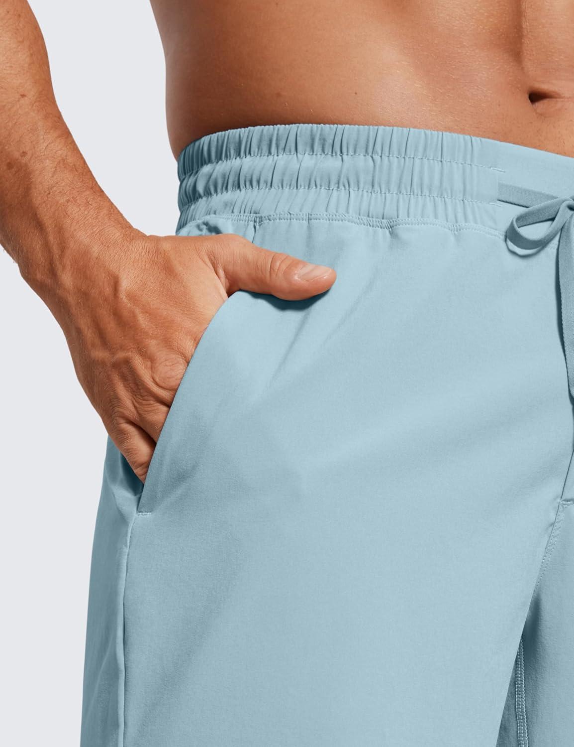 imageCRZ YOGA Mens Linerless Workout Shorts 7 Quick Dry for Running Sports Athletic Gym with PocketsLight Grayish Blue