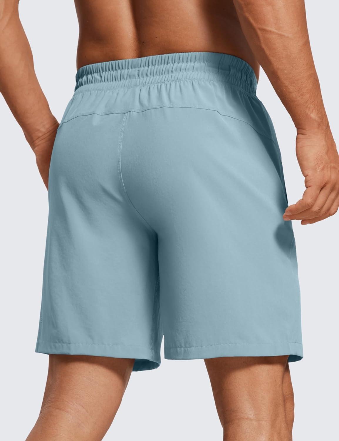 imageCRZ YOGA Mens Linerless Workout Shorts 7 Quick Dry for Running Sports Athletic Gym with PocketsLight Grayish Blue