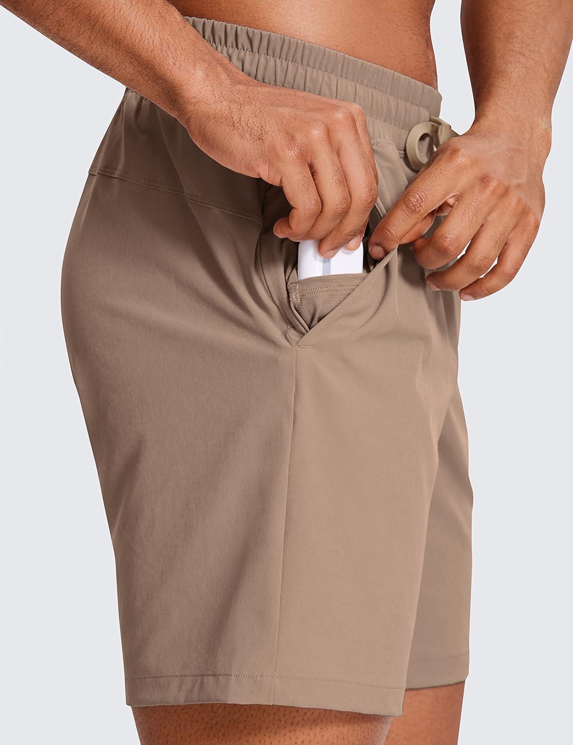 imageCRZ YOGA Mens Linerless Workout Shorts 7 Quick Dry for Running Sports Athletic Gym with PocketsMineral Brown