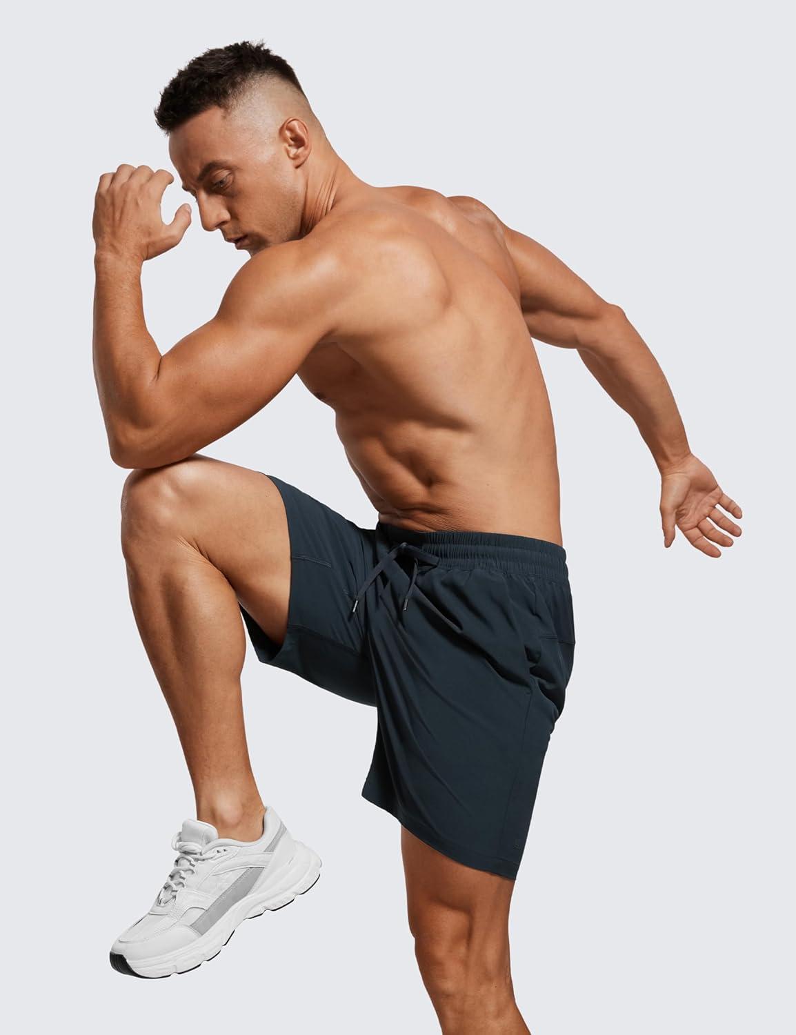 imageCRZ YOGA Mens Linerless Workout Shorts 7 Quick Dry for Running Sports Athletic Gym with PocketsTrue Navy