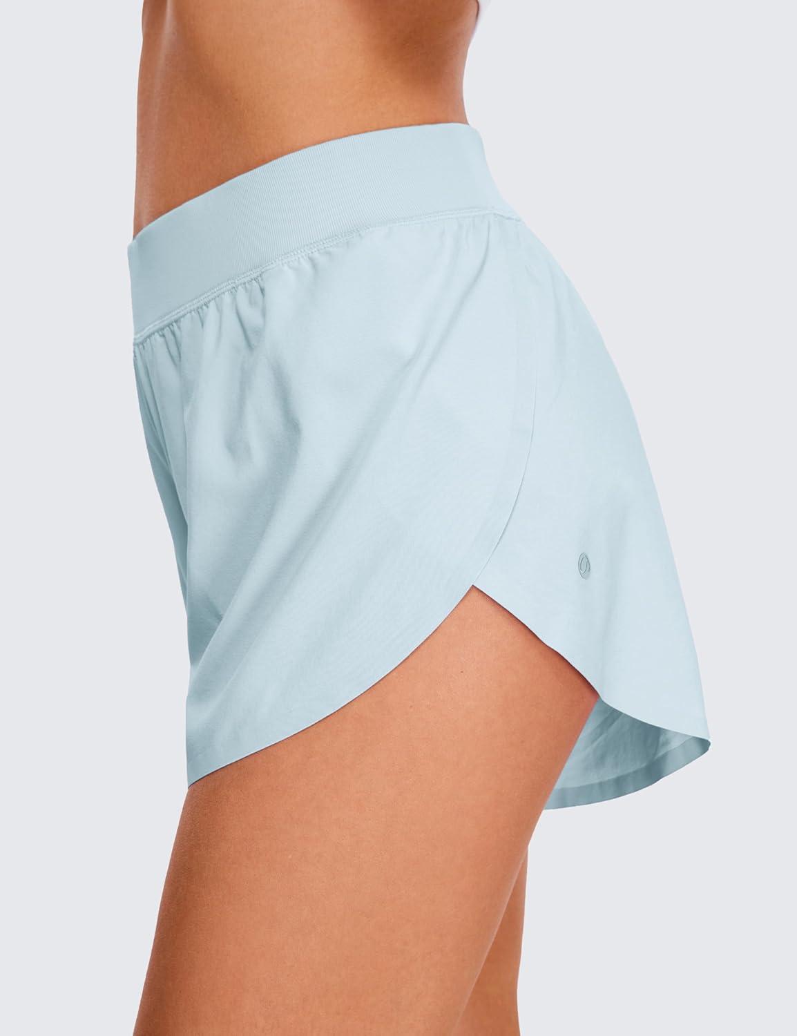 imageCRZ YOGA Mid Waisted Split Running Shorts for Women 4quot Comfy Mesh Liner for Workout Athletic Gym Track Quick DryBlue Linen
