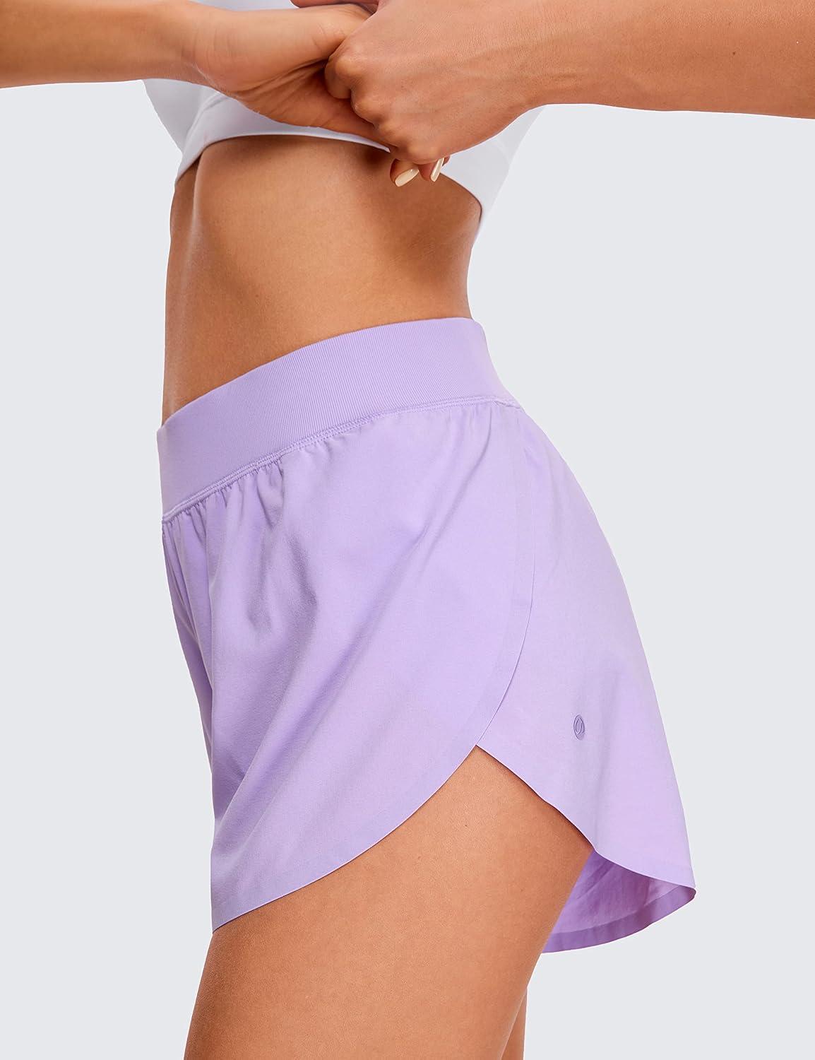 imageCRZ YOGA Mid Waisted Split Running Shorts for Women 4quot Comfy Mesh Liner for Workout Athletic Gym Track Quick DryLilac