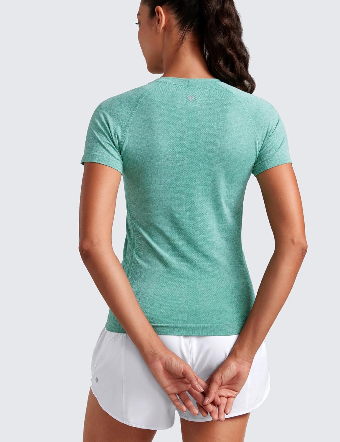 imageCRZ YOGA Seamless Workout Tops for Women Hip Length Athletic Running Gym Yoga Short Sleeve Shirts Breathable Crewneck TeesCascadia Green Heather