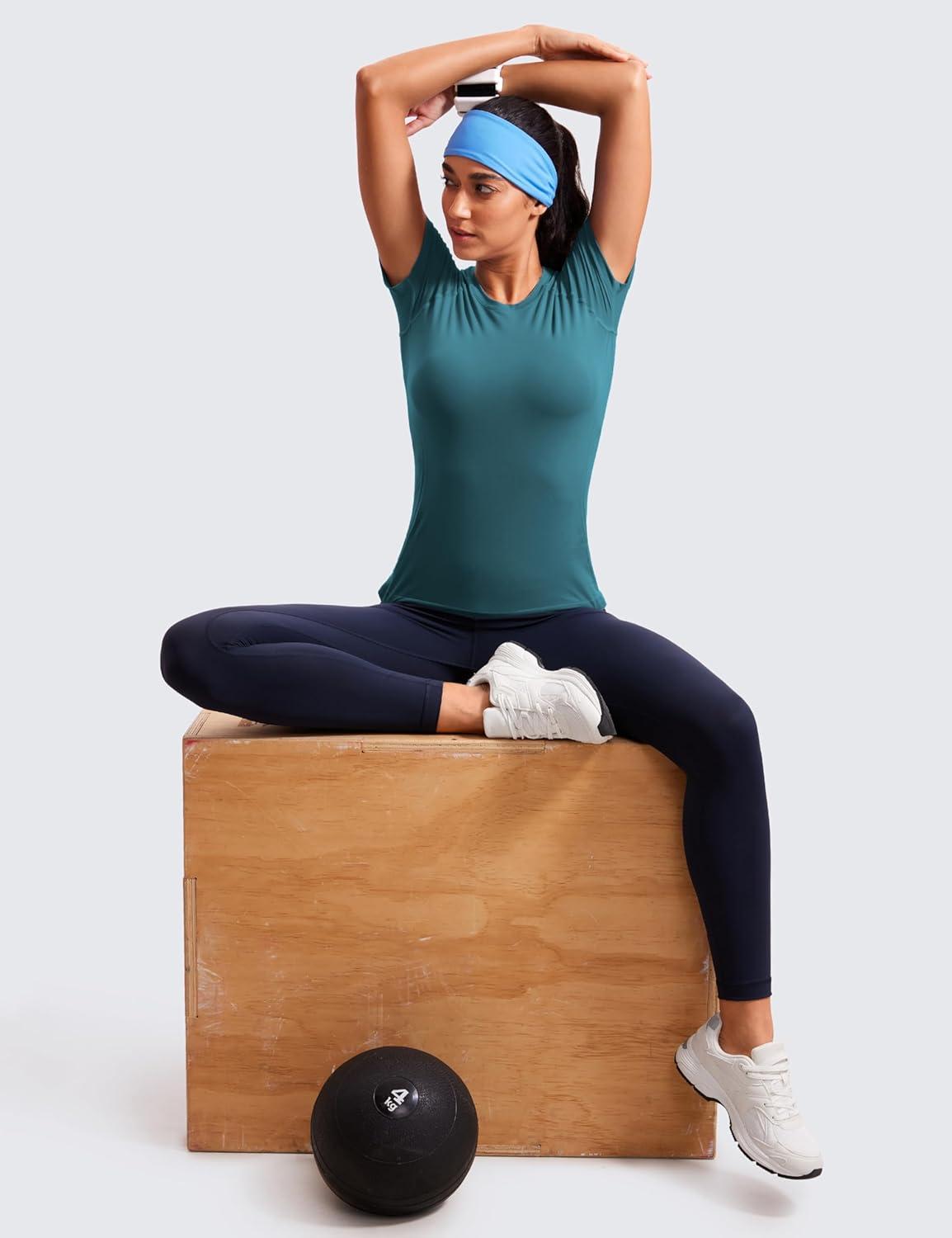 imageCRZ YOGA Seamless Workout Tops for Women Hip Length Athletic Running Gym Yoga Short Sleeve Shirts Breathable Crewneck TeesGreen Jade