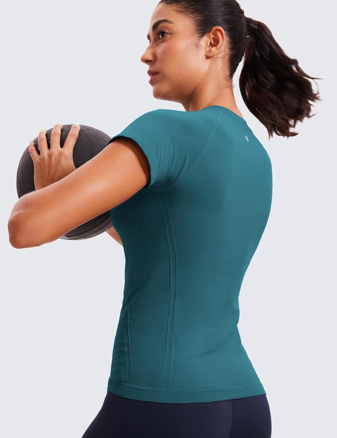 imageCRZ YOGA Seamless Workout Tops for Women Hip Length Athletic Running Gym Yoga Short Sleeve Shirts Breathable Crewneck TeesGreen Jade