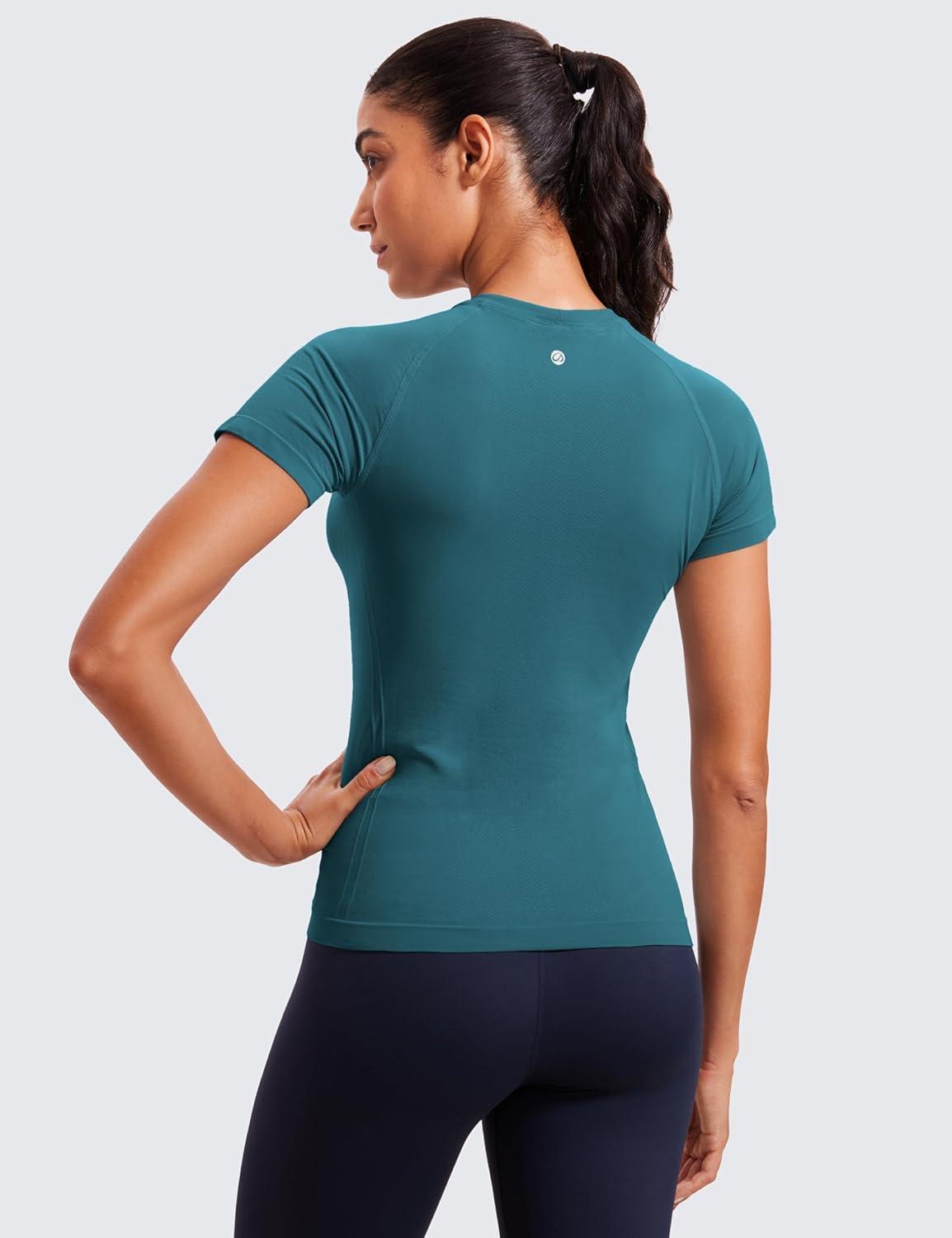 imageCRZ YOGA Seamless Workout Tops for Women Hip Length Athletic Running Gym Yoga Short Sleeve Shirts Breathable Crewneck TeesGreen Jade