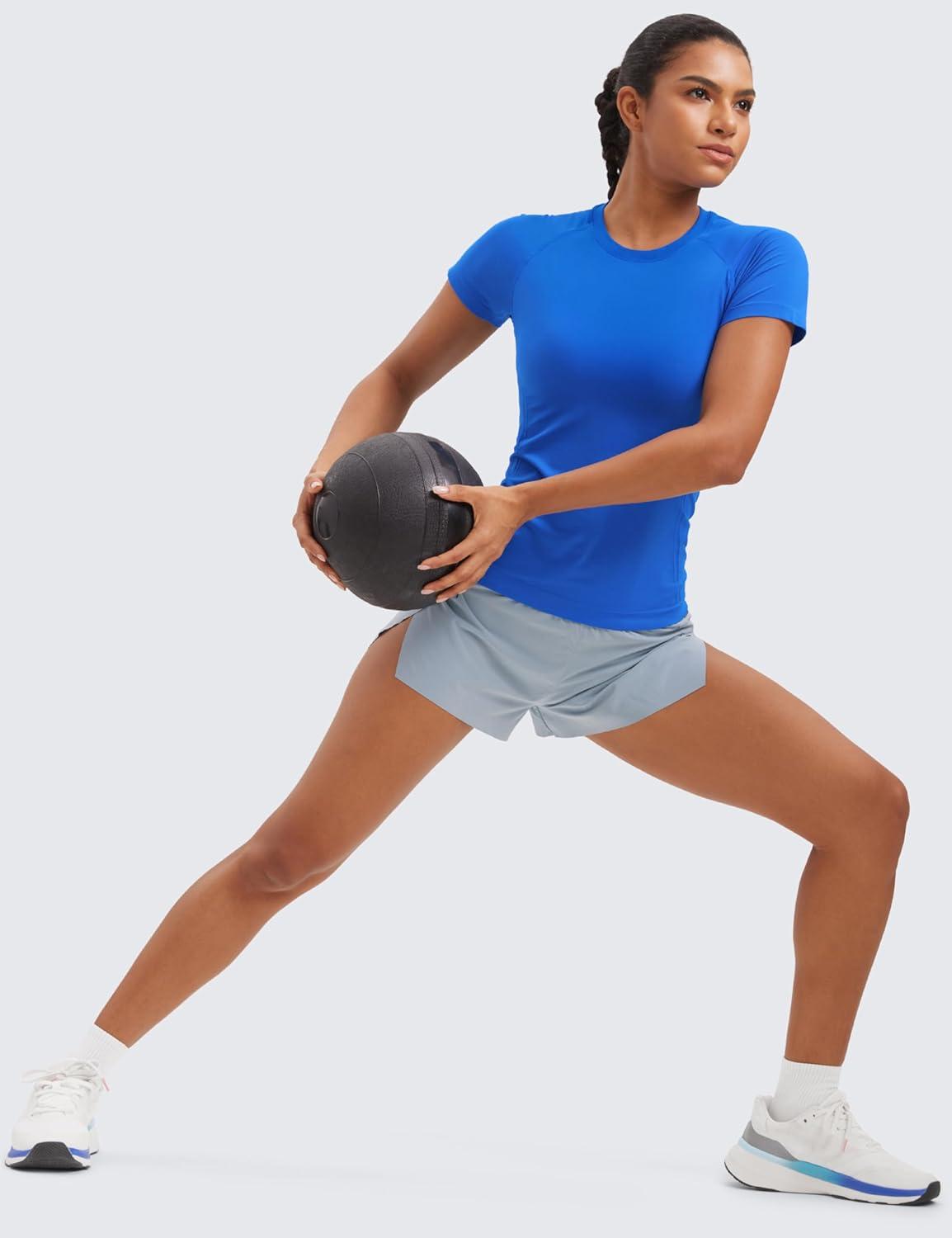 imageCRZ YOGA Seamless Workout Tops for Women Hip Length Athletic Running Gym Yoga Short Sleeve Shirts Breathable Crewneck TeesSparkle Blue