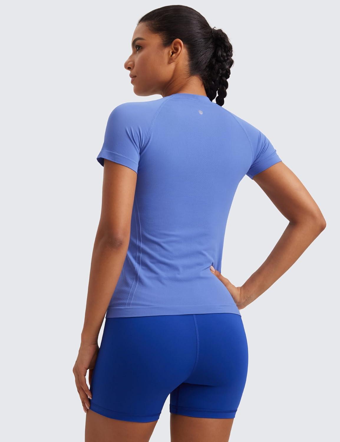imageCRZ YOGA Seamless Workout Tops for Women Hip Length Athletic Running Gym Yoga Short Sleeve Shirts Breathable Crewneck TeesWild Indigo