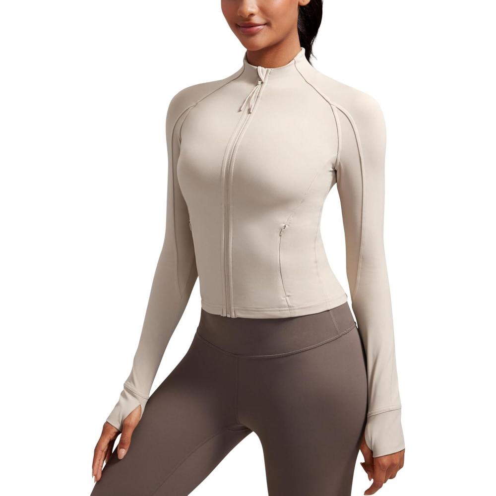 imageCRZ YOGA Butterluxe Waist Length Jackets for Women Full Zip Athletic Track Tops with Thumb Holes PocketsMojave Tan