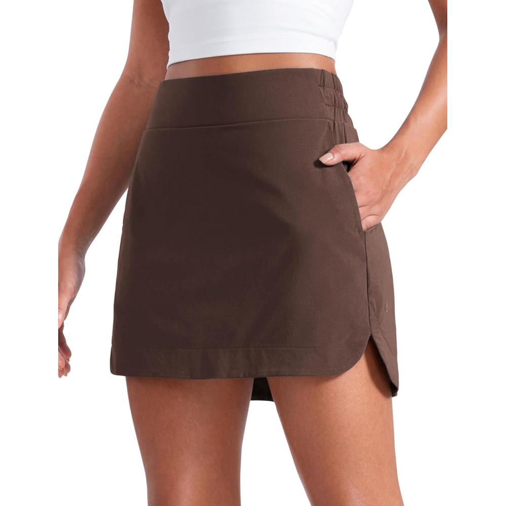 imageCRZ YOGA High Waisted Dolphin Golf Skirts for Women Mini Lined A Line Tennis Casual Skort with Side PocketsHot Fudge Brown