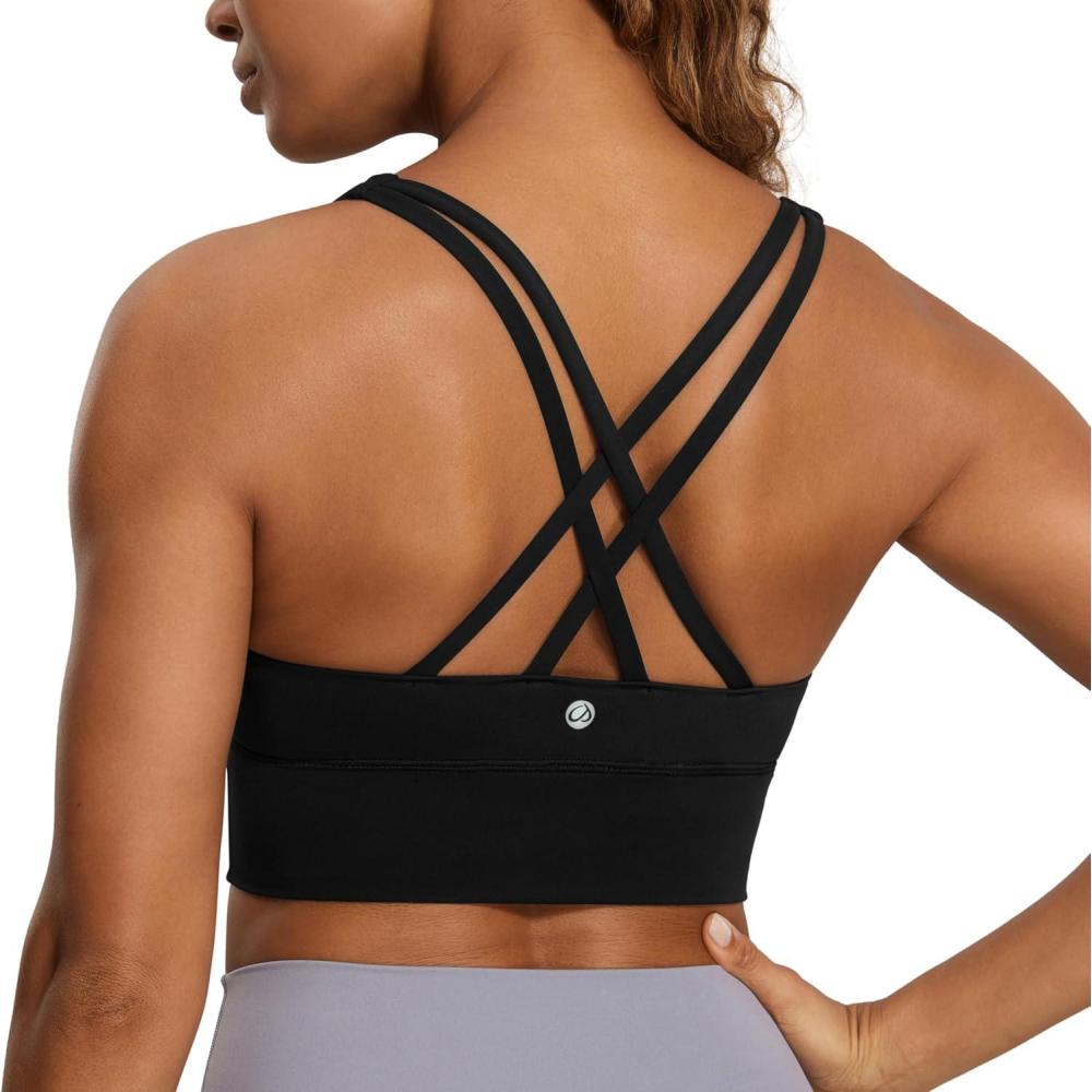 imageCRZ YOGA Naked Feeling Strappy Longline Sports Bras for Women Medium Impact Criss Cross Yoga Padded Workout Crop TopBlack