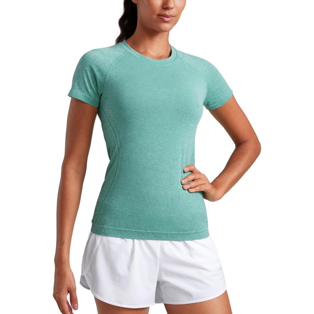 imageCRZ YOGA Seamless Workout Tops for Women Hip Length  Athletic Running Gym Yoga Short Sleeve Shirts Breathable Crewneck TeesCascadia Green Heather