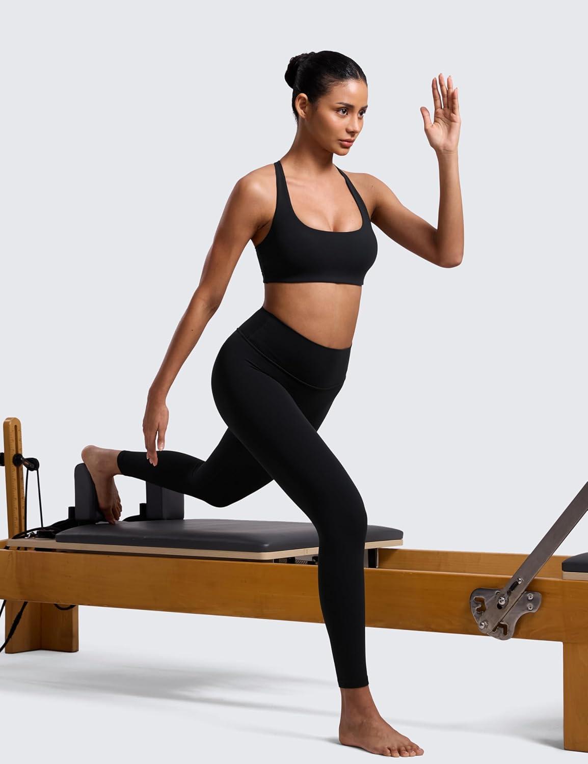 imageCRZ YOGA Butterlift Cross Back Sports Bras for Women Scoop Neck Adjustable Straps Wireless Padded Pilates Workout TopBlack