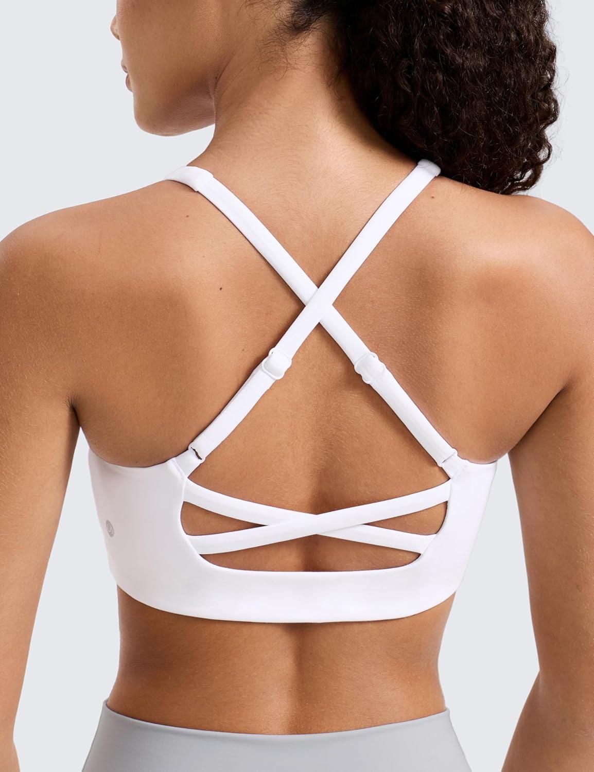 imageCRZ YOGA Butterlift Cross Back Sports Bras for Women Scoop Neck Adjustable Straps Wireless Padded Pilates Workout TopWhite