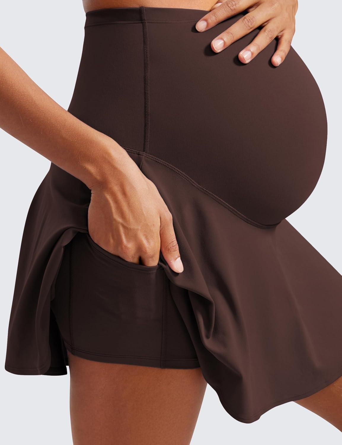imageCRZ YOGA Butterluxe Maternity Flowy Tennis Skirts High Waisted A Line Golf Athletic Casual Womens Pregnancy with PocketsHot Fudge Brown