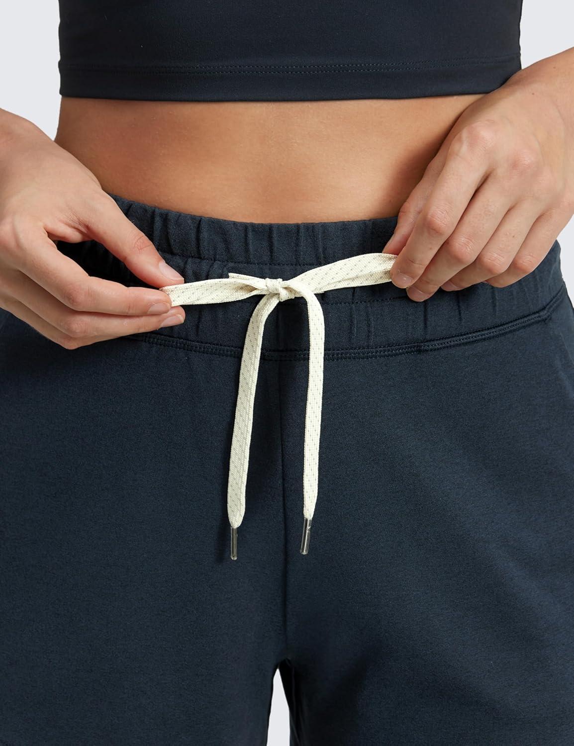 imageCRZ YOGA Cloud Jersey Dolphin Sweat Shorts for Women 3quot High Waisted for Casual Athletic Lounge with PocketsTrue Navy