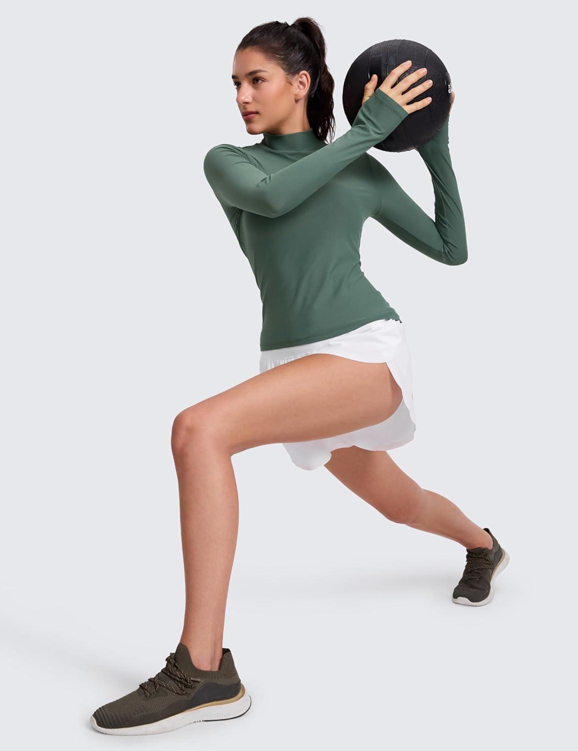 imageCRZ YOGA Cloudweight Mock Neck Shirts for Women Workout Athletic Long Sleeve Tops Lightweight Soft Hip TShirtGraphite Green