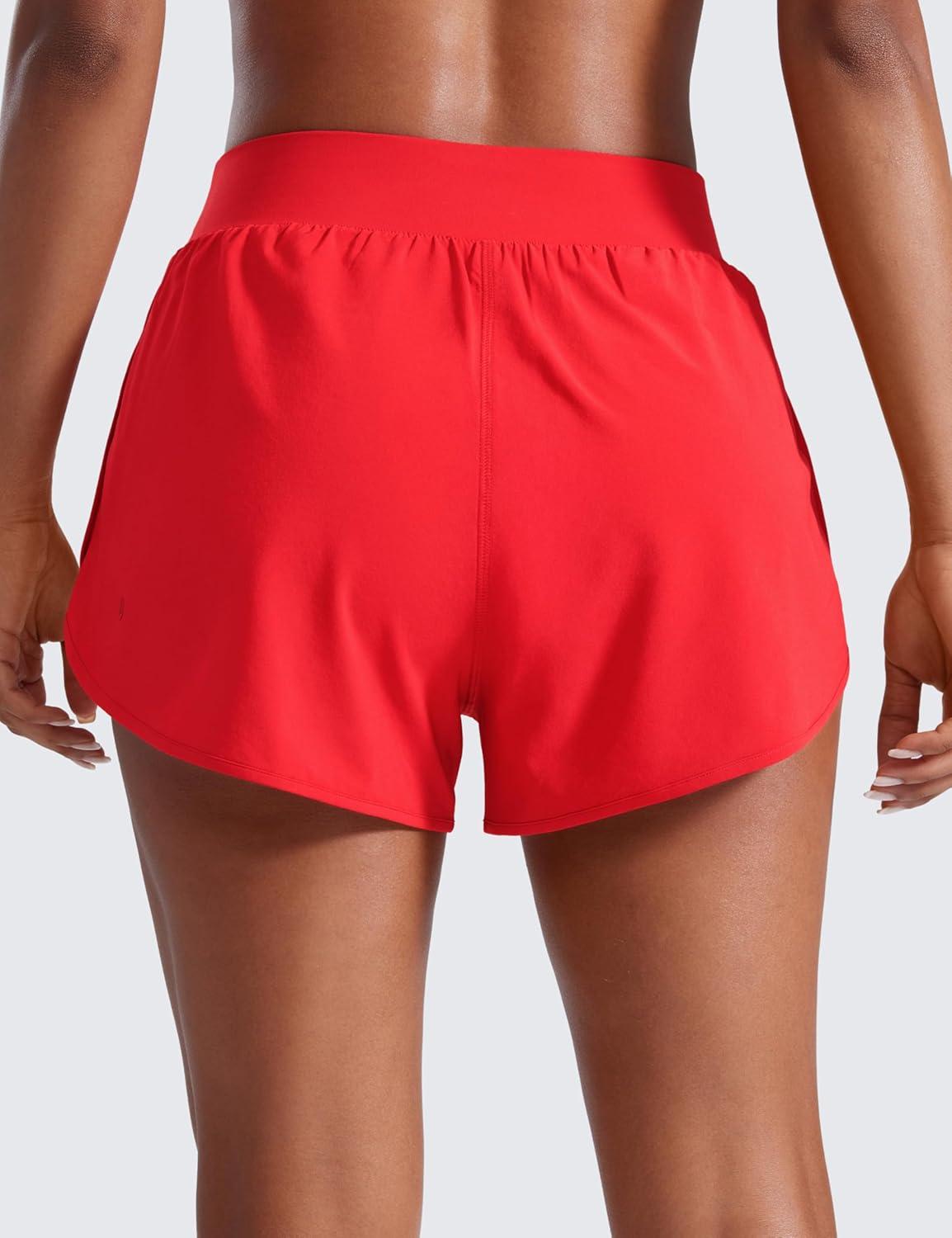 imageCRZ YOGA Dolphin Flat Waist Athletic Shorts for Women 3quot High Rise Quick Dry for Running Workout Gym Track with Zip PocketsDeep Red