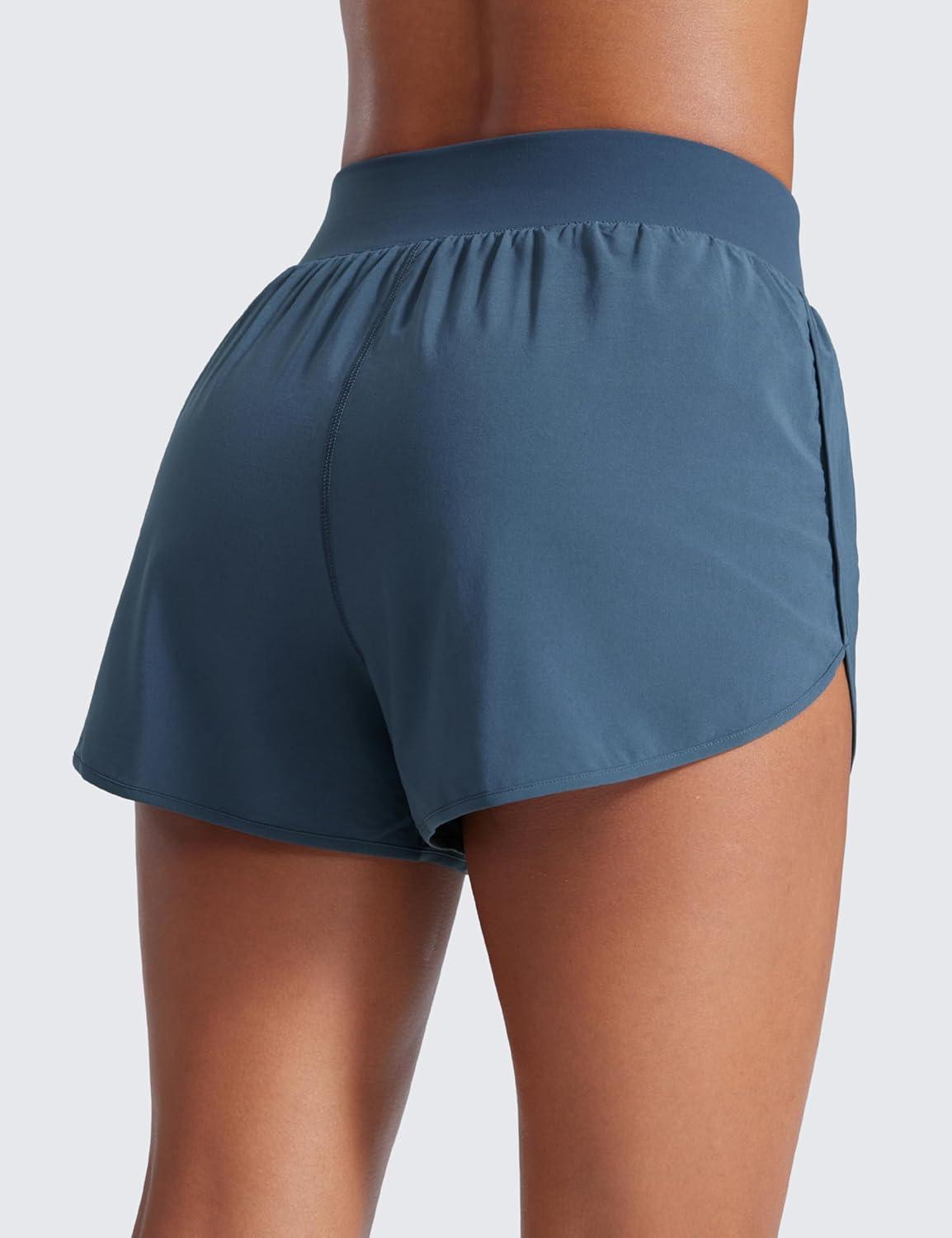 imageCRZ YOGA Dolphin Flat Waist Athletic Shorts for Women 3quot High Rise Quick Dry for Running Workout Gym Track with Zip PocketsStelindigo