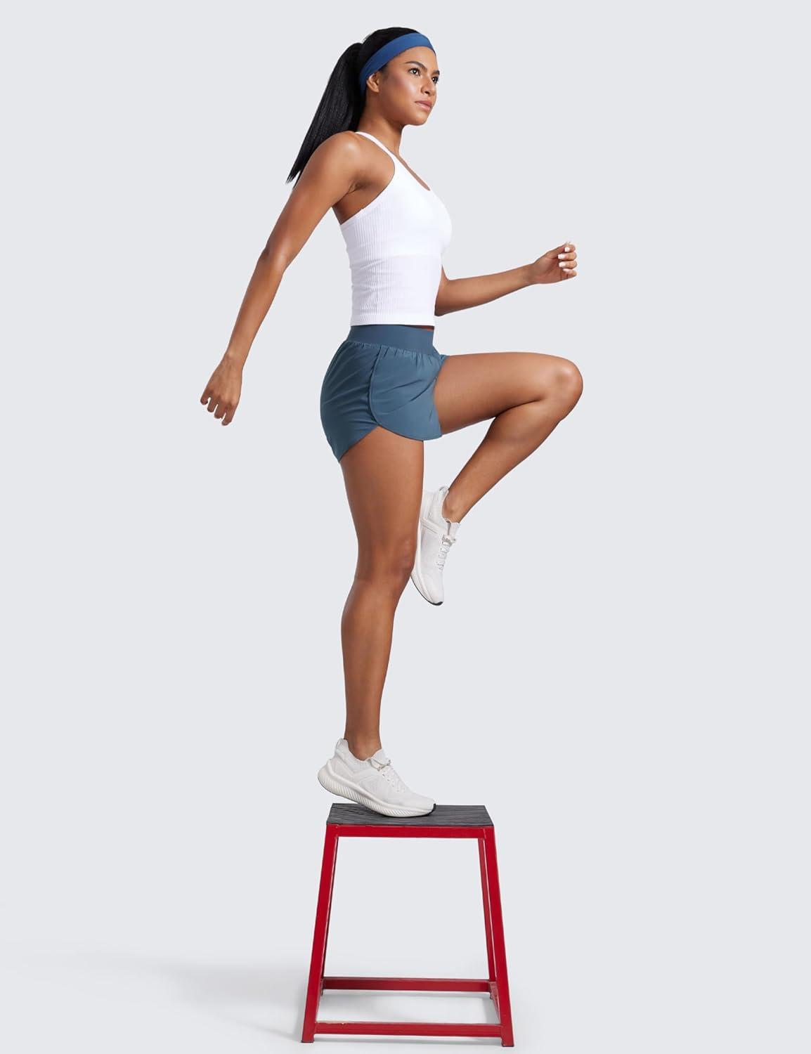 imageCRZ YOGA Dolphin Flat Waist Athletic Shorts for Women 3quot High Rise Quick Dry for Running Workout Gym Track with Zip PocketsStelindigo