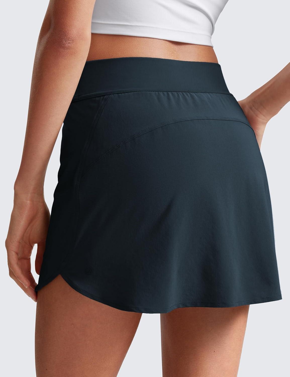 imageCRZ YOGA Dolphin Golf Skirts for Women A Line High Waisted Casual Athletic Mini Tennis Pickleball Skort with Zipper PocketTrue Navy