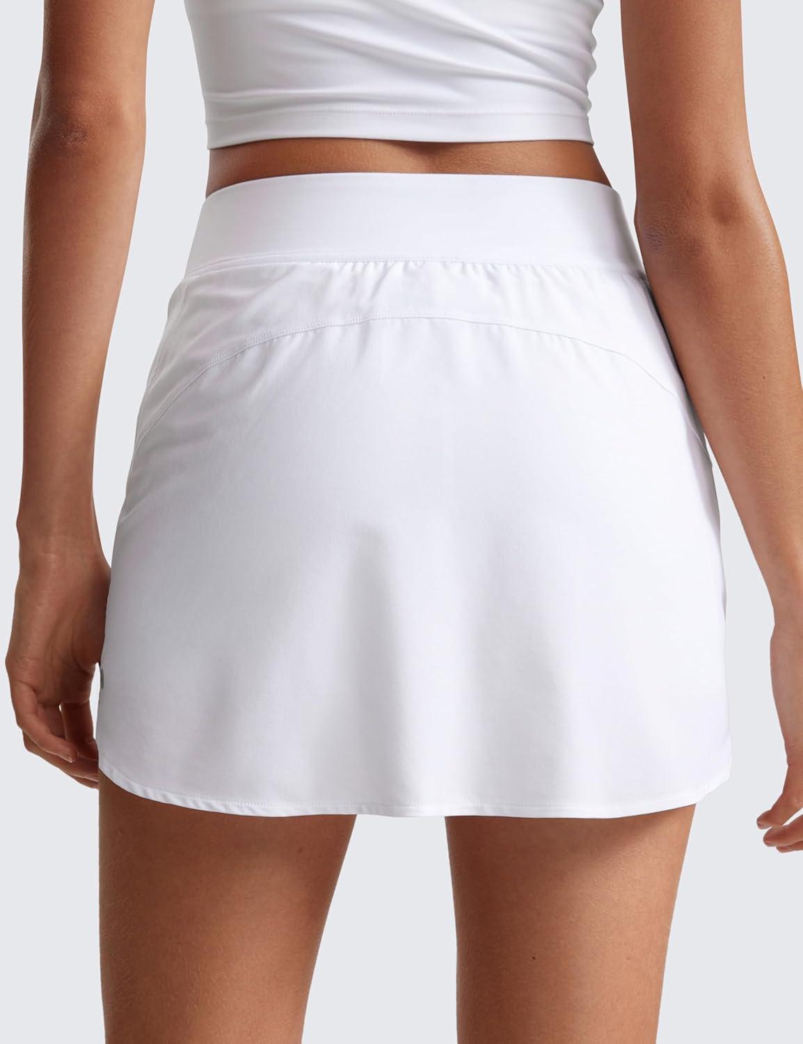 imageCRZ YOGA Dolphin Golf Skirts for Women A Line High Waisted Casual Athletic Mini Tennis Pickleball Skort with Zipper PocketWhite