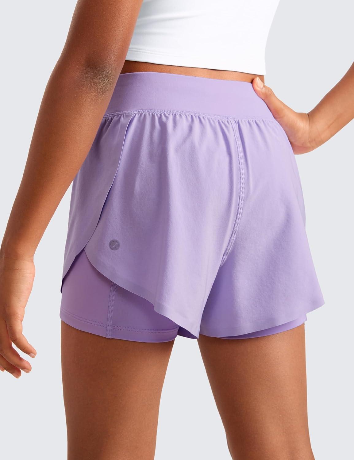 imageCRZ YOGA Girls FeatheryFit Soft 2 in 1 Dolphin Athletic Shorts Tennis Soccer Running Casual Liner Pockets Kids TeenLilac