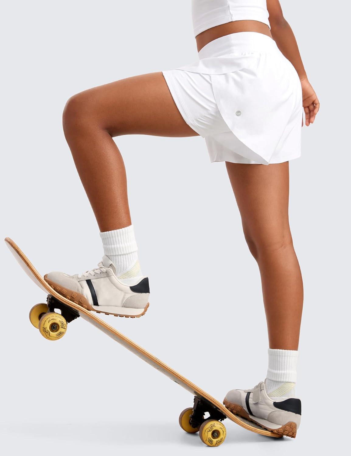 imageCRZ YOGA Girls FeatheryFit Soft 2 in 1 Dolphin Athletic Shorts Tennis Soccer Running Casual Liner Pockets Kids TeenWhite