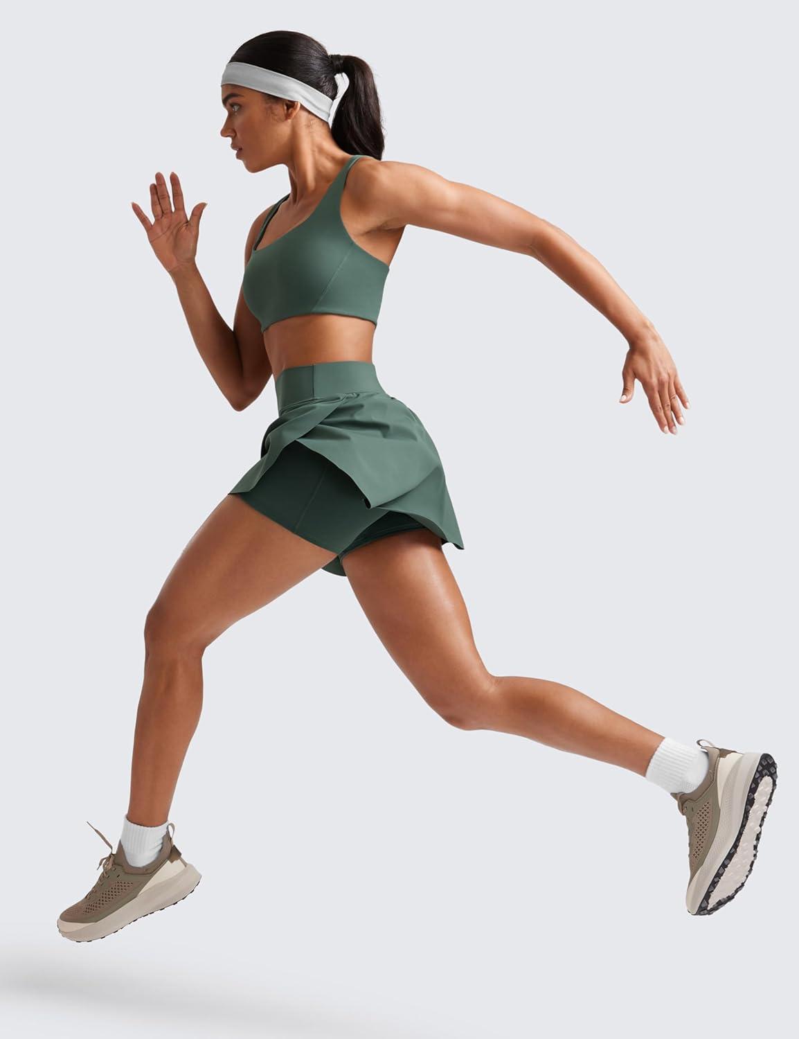 imageCRZ YOGA High Waisted Side Slit Tennis Skirts for Women Mini Lined A Line Running Athletic Skort with Inner PocketsDark Forest Green