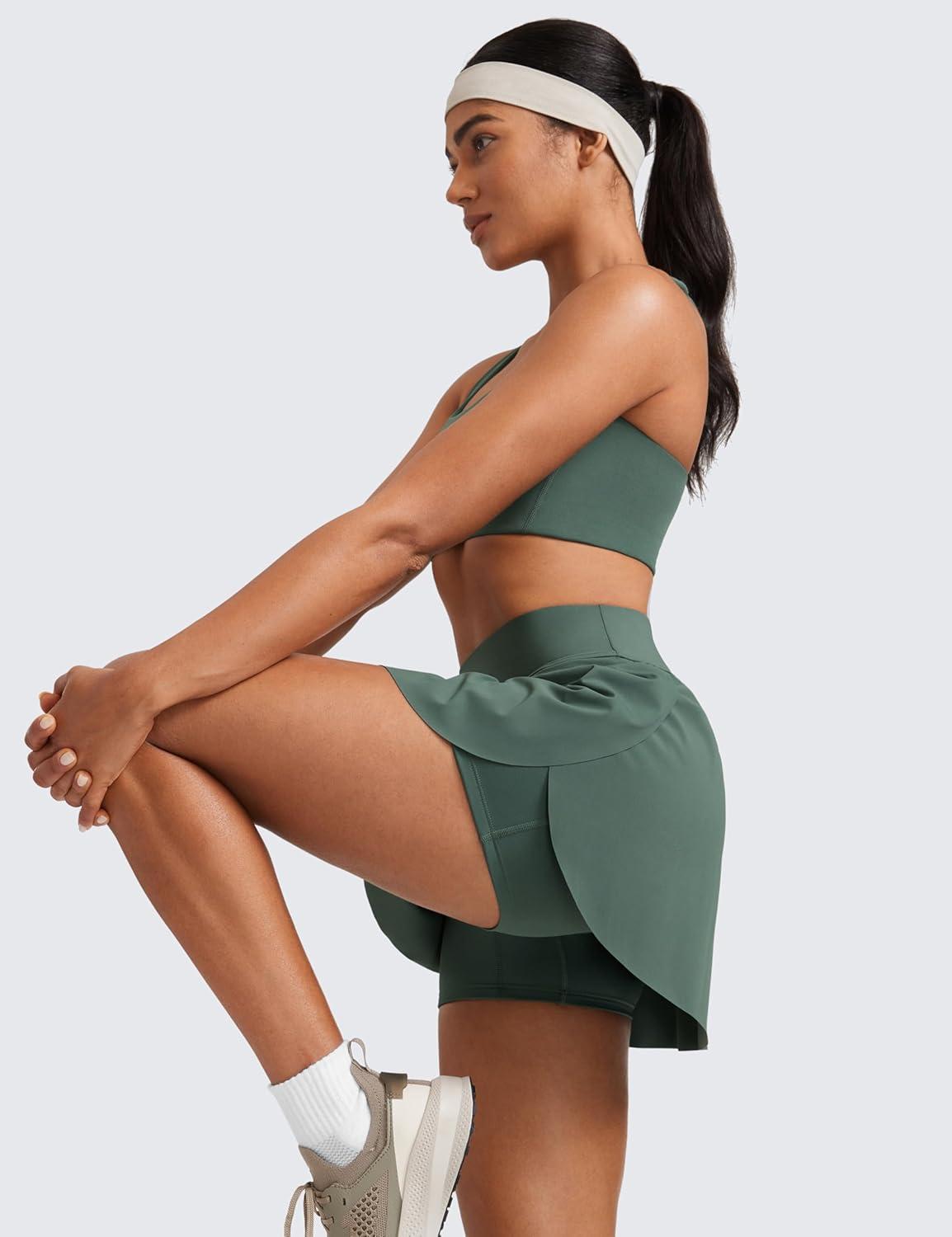 imageCRZ YOGA High Waisted Side Slit Tennis Skirts for Women Mini Lined A Line Running Athletic Skort with Inner PocketsDark Forest Green