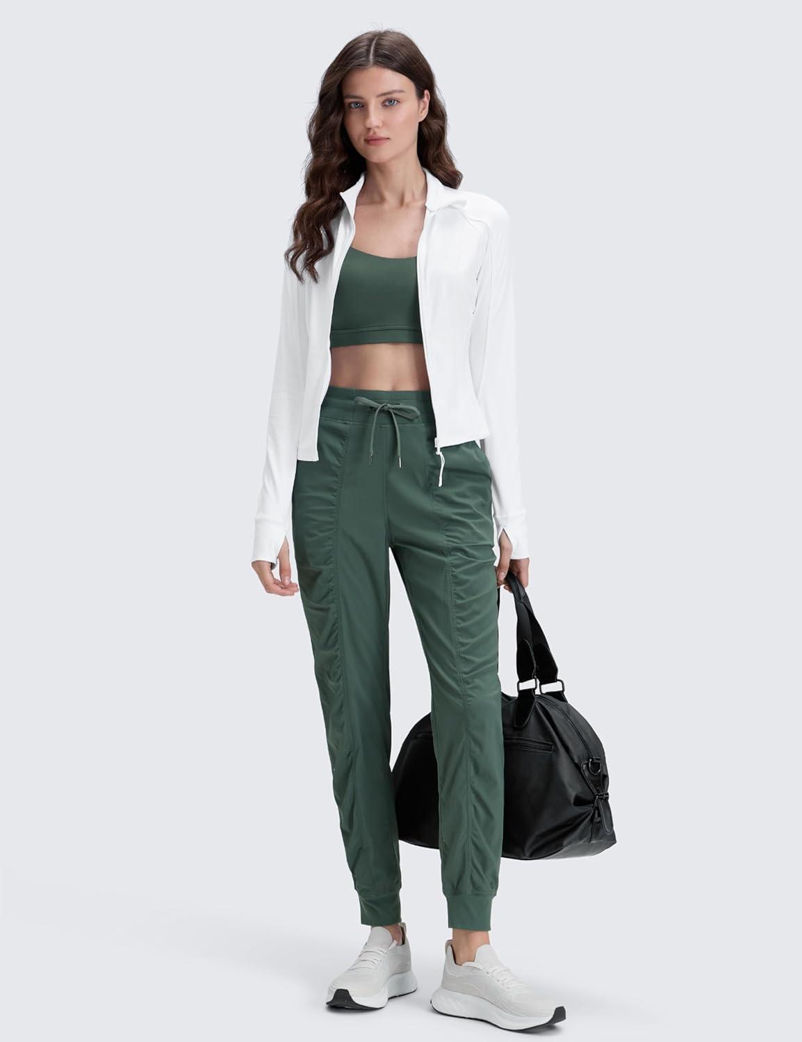 imageCRZ YOGA Lightweight Workout Joggers for Women 26quot285quot305quot Outdoor Running Casual Pants with PocketsDark Forest Green