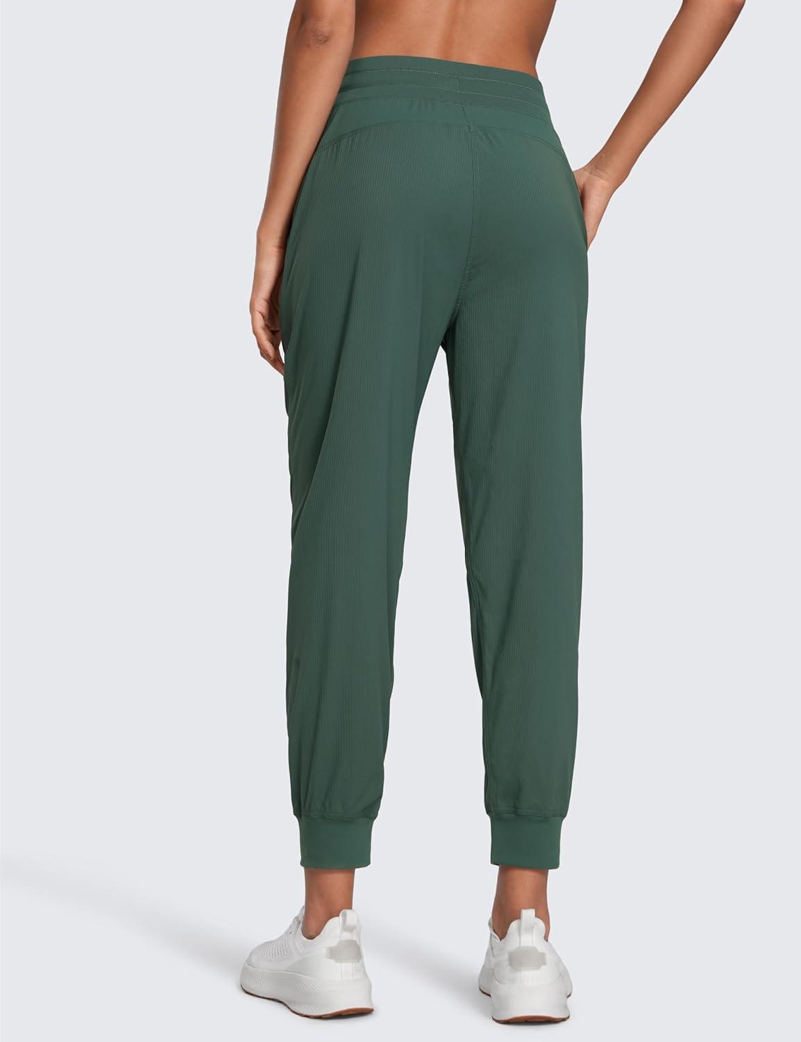 imageCRZ YOGA Lightweight Workout Joggers for Women 26quot285quot305quot Outdoor Running Casual Pants with PocketsDark Forest Green